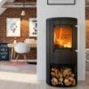 A Termatech freestanding stove in a contemporary room with log store below.