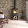 Woodburning stove with log store underneath