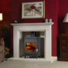 Burley Hollywell Woodburning Stove shown alight in a living room with red painted walls