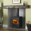 Burley Debdale stove shown in a contemporary living room with a wooden mantlepiece and green painted walls.