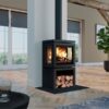 A woodburning stove in the middle of a living room.