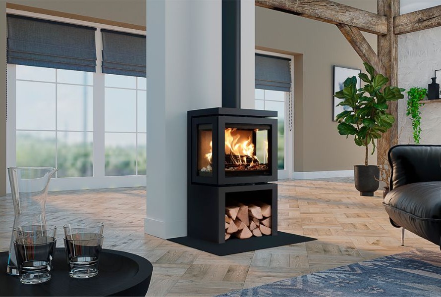 A woodburning stove in the middle of a living room.